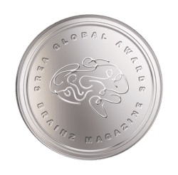 A silver coin with a brain on it.